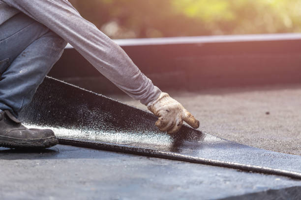 Professional Basement Waterproofing technician working in Junction City, OR